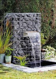 Modern Garden Waterfall Made With Gabion Basket Water Features In The Garden Modern Garden Design Modern Garden