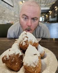 Where to find a lunch spot in Plattsburgh that serves sandwiches and beer  like Carbur's?