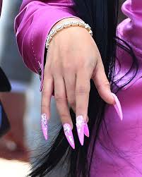 As the baby has gotten older, her signature pointy shape has come back into the picture. Cardi B Rocks Bright Pink Plunging Suit With Nothing Underneath Wild Nails For Latest Court Appearance Cardi B Nails Queen Nails Bright Pink Nails