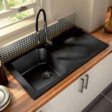 Black kitchen sink is a wonderful, stylish and functional choice. Top 15 Black Kitchen Sink Designs Mostbeautifulthings Modern Kitchen Sinks Kitchen Sink Design Black Kitchen Sink