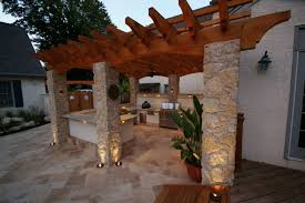 Pergolas decorated with vines or other climbing plants are gorgeous! Five Pergola Lighting Ideas To Illuminate Your Outdoor Space