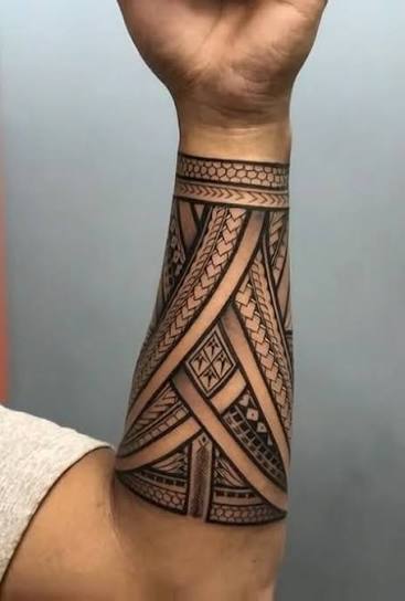 Maori Koru Spiral Tattoo Arm