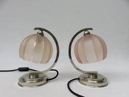 Supplement your floor or overhead lighting with an extra glint from the accent table or side table. Glass Side Table Lamps Online