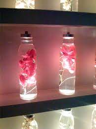 Preserving flowers in the resin can be done with necklaces, bracelets, pendants, rings and so much more. Look Immersed Flowers At Kittichai How To Preserve Flowers Mason Jar Lamp Floral Arrangements