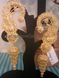 Tanishq offers the best gold earrings designs, studs, jhumkas, etc. 9 Latest Temple Jewelry Jhumka Designs Styles At Life