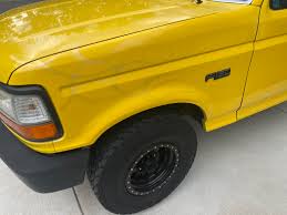 Image result for Bright Yellow 1990 Truck