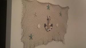 My Beach Inspired Home Decor Hobby Lobby Fishnet Seashells And Anchor From Big Lots Around 20 Bucks Total And Covers Inspired Homes Beach Inspired Home Decor