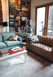Love The Mismatch Of The Colour Sofa To Contrast The Leather This Faded Turquoise G Mismatched Living Room Furniture Relaxing Living Room Living Room Leather