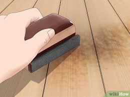 Scrub the affected site with your cleaning solution of choice 4 Ways To Clean Mold From Wood Wikihow