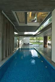 Indoor Pool Glass Walls Poona House In Mumbai India By Rajiv Saini Luxury Pools Indoor Pool Houses Luxury Swimming Pools