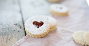 Arrange the linzer heart cookies on 1 of the baking sheets with the flat underside facing up. Holiday Linzer Cookies The Organic Kitchen Blog And Tutorials