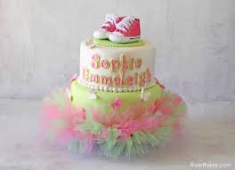 Pink and brown baby shower cake with gumpaste booties and flowers. Pink Green Tutu Baby Shower Cake With Butterflies And Pink Converse Shoes Rose Bakes