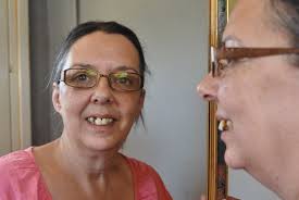 NHS 111 dentist: Desperate mother pulls her own teeth out three times after  failing to get dental appointment
