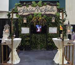 White Draping With Uplighting Two High Tops And Beach Arch Bridal Show Booths Wedding Expo Booth Wedding Show Booth