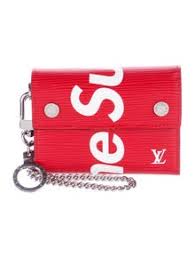 The material include epi leather, monogram canvas and calf leather. Louis Vuitton X Supreme 2017 Epi Chain Wallet W Tags Accessories Lousu20054 The Realreal