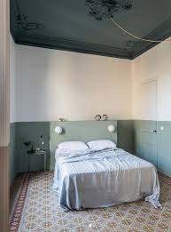 20 Above Bed Decor Ideas Architectural Digest Make sure to use a hanger that will hold weight well above the weight of your pieces for extra security.