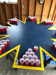 Set up beer pong the ordinary muggle way 10 cups in a pyramid on each side full of beer. I Made A 16 Person Beer Pong Table Drinkinggames