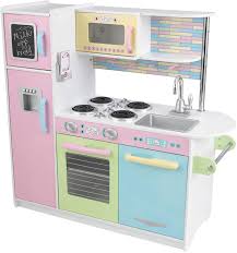 The uptown white play kitchen set offers the most realistic cooking experience a child could possibly have (minus the actual cooking part). Amazon Com Kidkraft Uptown Pastel Wooden Play Kitchen With Chalkboard Play Phone And See Through Doors Gift For Ages 3 Toys Games