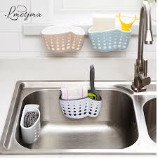 The sponge holder is stainless steel while the magnets secure it to the interior of the sink. Lmetjma Kitchen Sponge Holder With A Sponge Suction Cup Bathroom Sucker Holder Sink Soap Sponge Drain Rack Storage Holder Kc0001 Sponge Holder Kitchen Sponge Holderstorage Holder Aliexpress