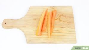 To julienne a carrot, first peel the carrot with a vegetable peeler or paring knife. 3 Ways To Julienne Carrots Wikihow