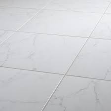 This fine mixture of clay is baked and pressed with tremendous force into a set size and shape, which gives the flooring its outstanding ability to withstand force and stress without breaking. Elegance White Gloss Marble Effect Ceramic Wall Floor Tile Pack Of 7 L 600mm W 300mm Diy At B Q