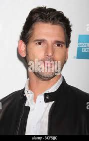 In this April 29, 2009 photo, Danielle Marks, top left, poses with her  husband Tad Marks and their children, Jesse Marks, 4, below left, and  Susana Nickerson, 9, in front of their