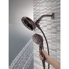 Delta is a brand name that is both well known and reliable with 50 years of providing beautiful and functional faucets and accessories. Delta Nura Venetian Bronze 1 Handle Shower Faucet With Multi Function Showerhead Amazon Com