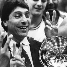 Head Coach James "Jim" Valvano, Quentin Jackson, and men's basketball team