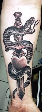 Discover thousands of free snake tattoos & designs. Snake Dagger Tattoo Design Dagger And Snake Tattoo 2020