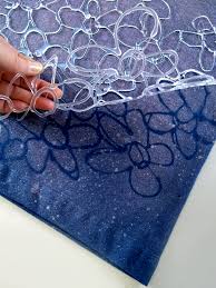 Batik Style T Shirt Using A Hot Glue Stencil And Bleach Spray Hot Glue Stencil Tie Dye Crafts Hot Glue Art