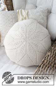 The perfect accent on a chair, sofa or bed. White Flower Pillow Drops 178 39 Free Knitting Patterns By Drops Design