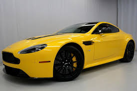 Image result for Sunburst Yellow 2017 Aston Martin