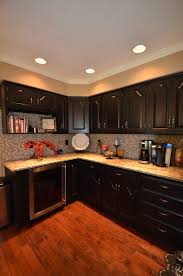 Pin By Heather Andereck On Kitchen Oak Cabinets Black Kitchen Cabinets Black Kitchens