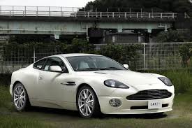The first generation v12 vanquish was launched at geneva motor show in 2001 and hand built at newport pagnell. Aston Martin Vanquish S Carzy