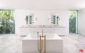 billionaire marina acton flipping out of kim and kanye s old bel air mansion for 18m because it s not big enough american luxury bel air mansion kim and kanye house minimalist home