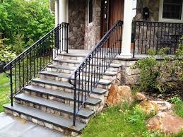 Looking for metal railings for your front step? Impressive Black Wrought Iron Porch Railings For Farmhouse Design Ideas With Stone Steps And Rock Garden Railings Outdoor Exterior Stairs Front Porch Steps