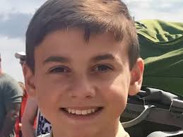 Community Celebrates Life Of Beloved 'Hug Machine' Teacher