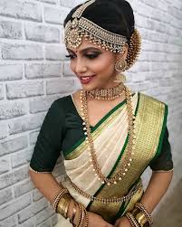 2 835 Likes 34 Comments Bridal Hair Makeup Magic Colours Bygaurysri On Instagram Indian Wedding Wear Indian Bride Makeup Exclusive Saree Blouse Designs