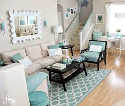 Easy Breezy Living In An Aqua Blue Cottage Beach Bliss Living Beach Theme Living Room Coastal Decorating Living Room Beach Living Room