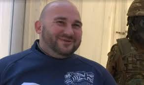 Britain's 'most injured soldier' completes epic open water swim with just  his arms