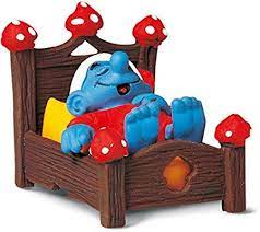 Amazon Com Schleich Smurf In Bed Toy Figure Toys Games Smurfs Toys Figurines