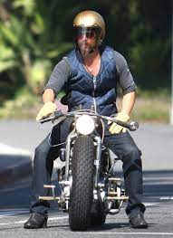 Brad Pitt Took One Of His Many Motorcycles For A Joy Ride Around La On Saturday He Stopped Off For A Quick Bite At The Beverly Hills Hotel But His Serene And