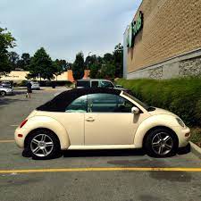 A Harvest Beige Vw Beetle Convertible Spotted At Capilano Mall North Vancouver Beetle Convertible Beetle Car Dream Cars