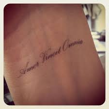Love Conquers All Tattoo Quotes Small Wrist Tattoos Tattoos