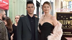 Though, he is 5′ 11″ in feet and inches and 182 cm in centimetres tall, he weighs about 170 lbs in pound and 77kg in kilograms. Adam Levine S Wife Behati Prinsloo Pregnant With Couple S 2nd Child Abc News