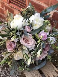 Hand Tied Bouquet Of Amnesia Roses Quicksand Roses Peoneys Oxypetal Ranunculus Seeded Eucalyptus Olive Fi Rose Bouquet Wedding Flowers Wedding Bouquets