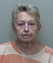 Cigarette-flipping mom arrested after son shows officers mark