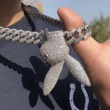 It is often seen in gothic fashion or heavy metal, and is a symbol of humility. Upside Down Bunny Cuban Chain Helloice Jewelry