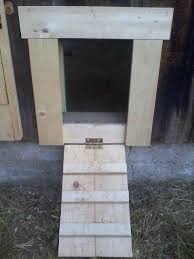 The perfect traits of a diy chicken coop. Chicken Coop Chicken Door Ramp Serves As Door Opens Out Locks From Inside Http Www Backyardchickens Com Foru Chicken Diy Chicken Coop Best Chicken Coop