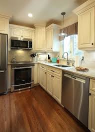 4 Non Wood Hardwood Flooring Alternatives For Kitchens Kitchen Remodel Design Wood Laminate Kitchen Kitchen Design Small